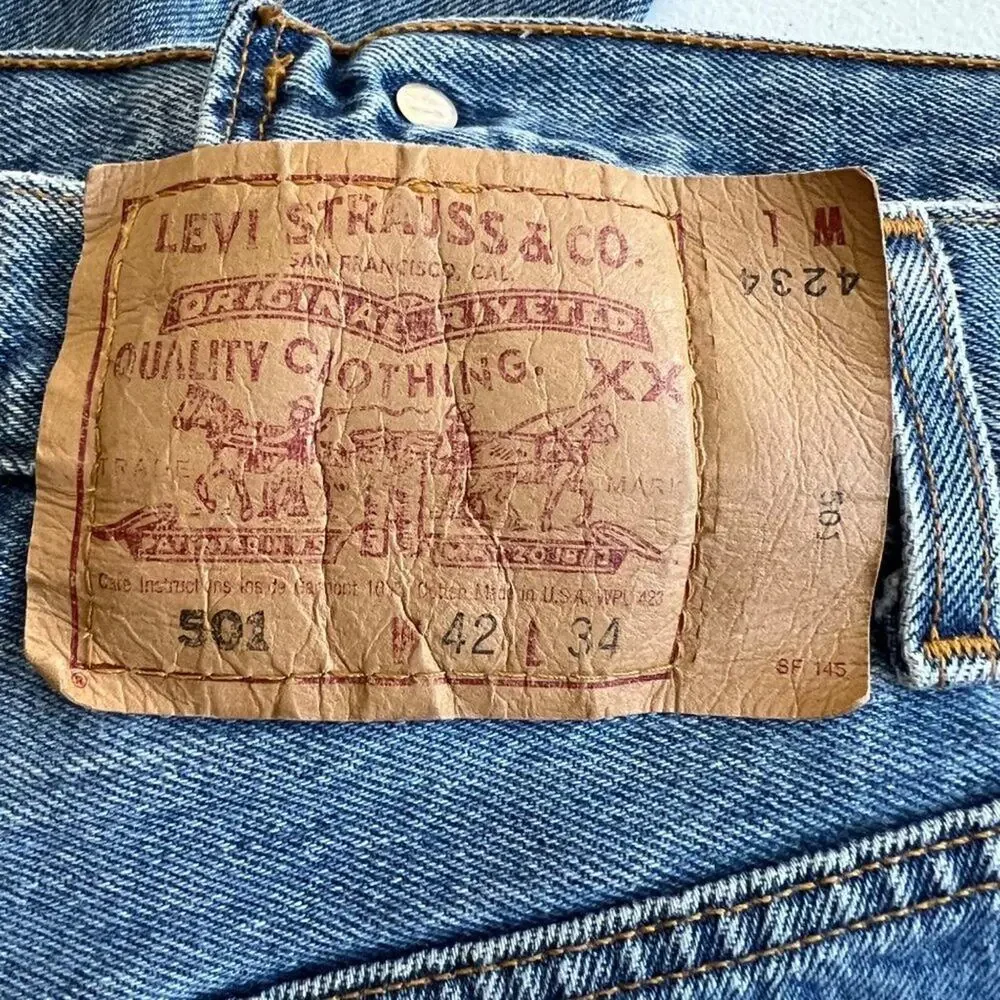 Vintage Levi's 501 USA Made Button Fly Jeans Distressed Hem 42x34 W42